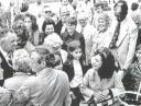 Elizabeth Taylor rides in golf cart at 1978 Suffolk Peanut Festival